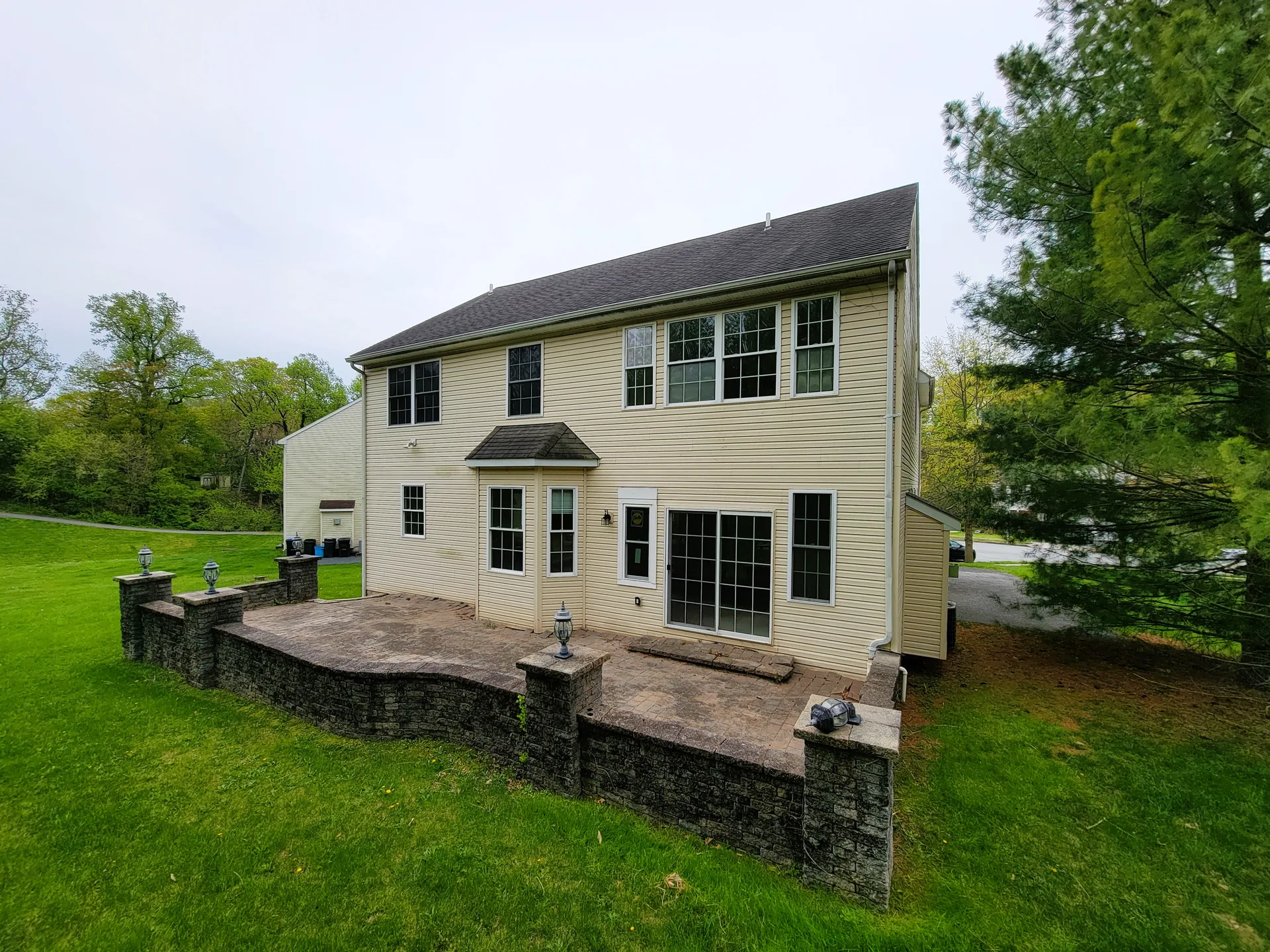 Rear exterior with stone patio