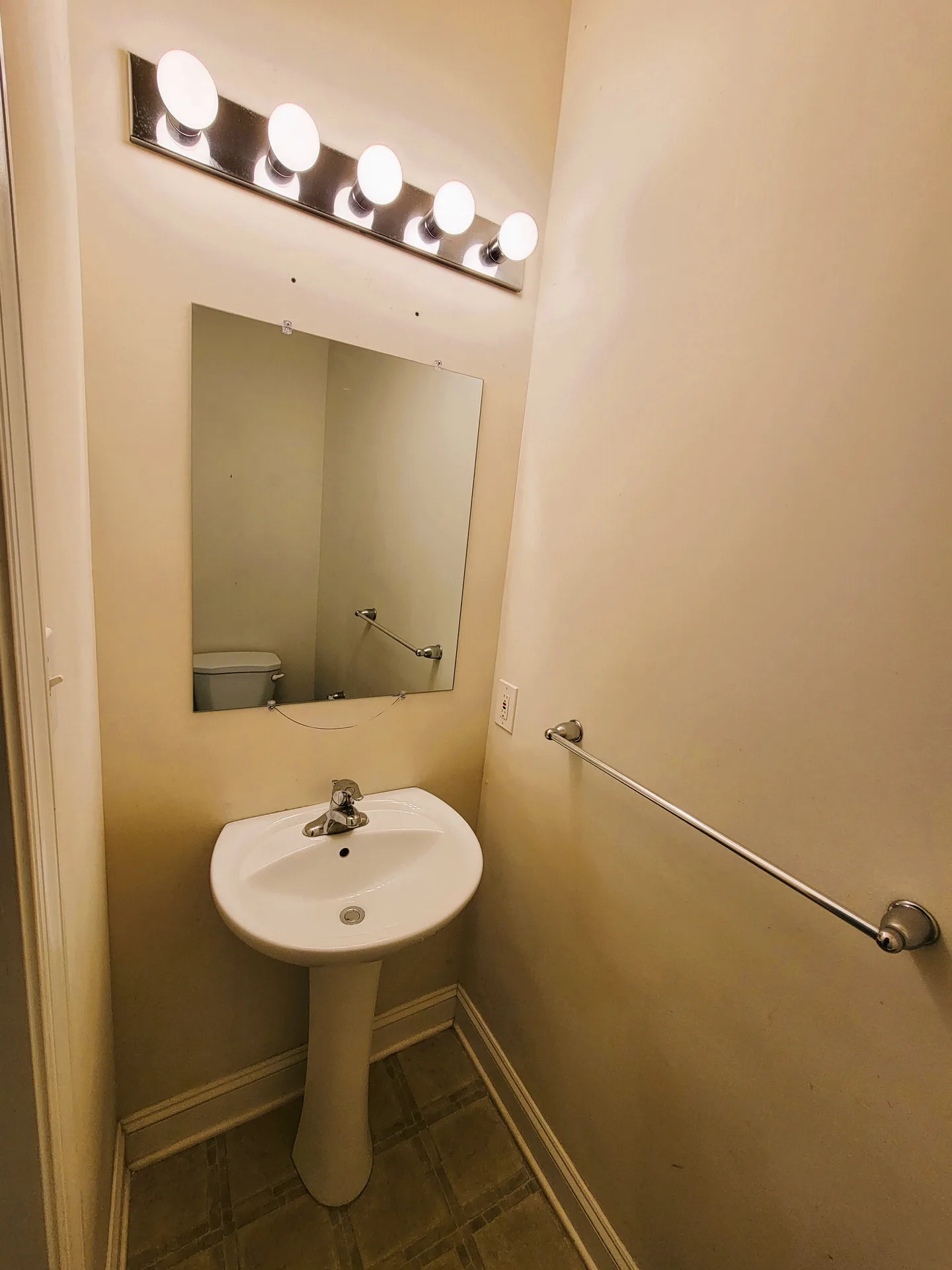 Powder room with pedestal sink