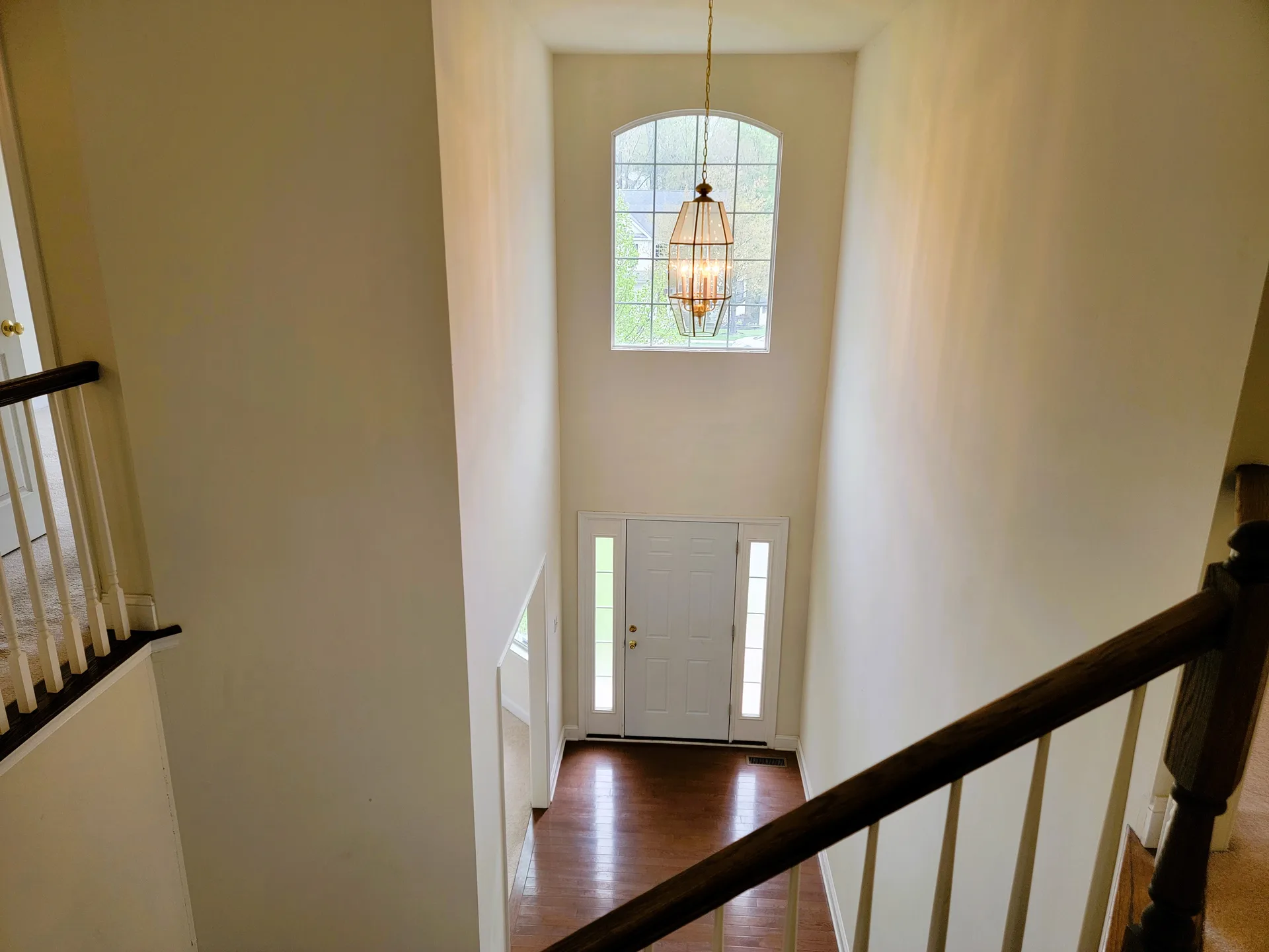 View from staircase landing looking into foyer