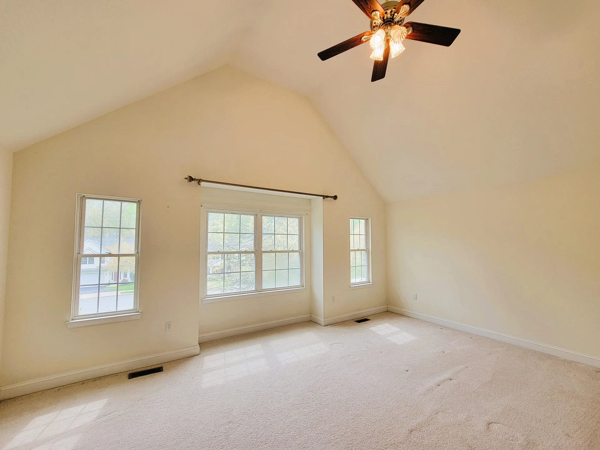 Bedroom with vaulted ceiling, vacant