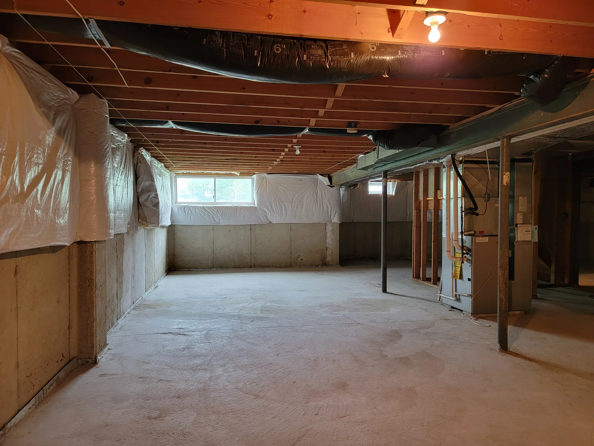 Unfinished basement concrete walls
