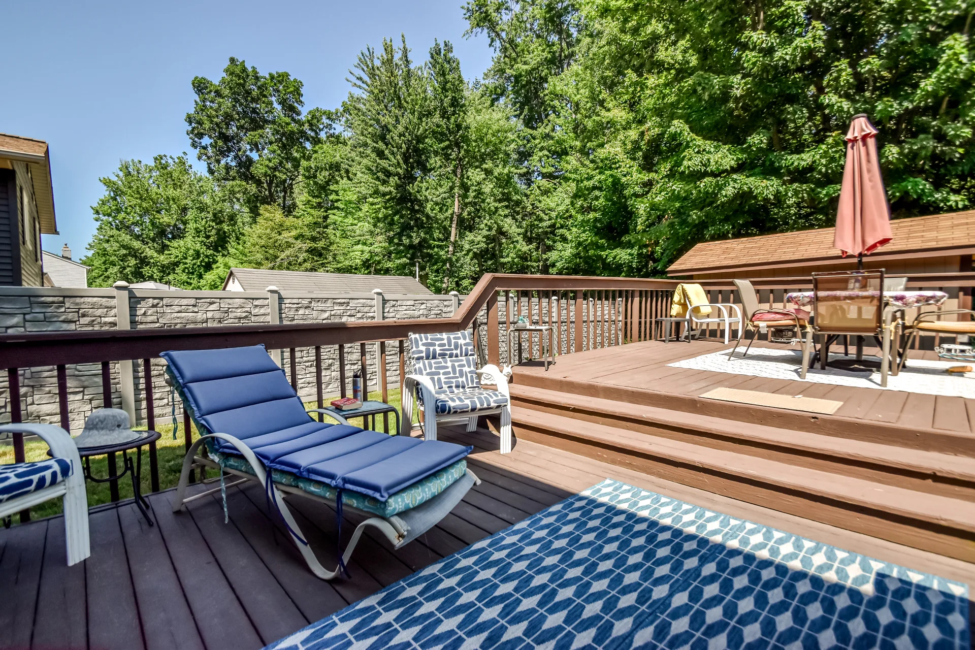 Multi-level backyard deck with outdoor seating