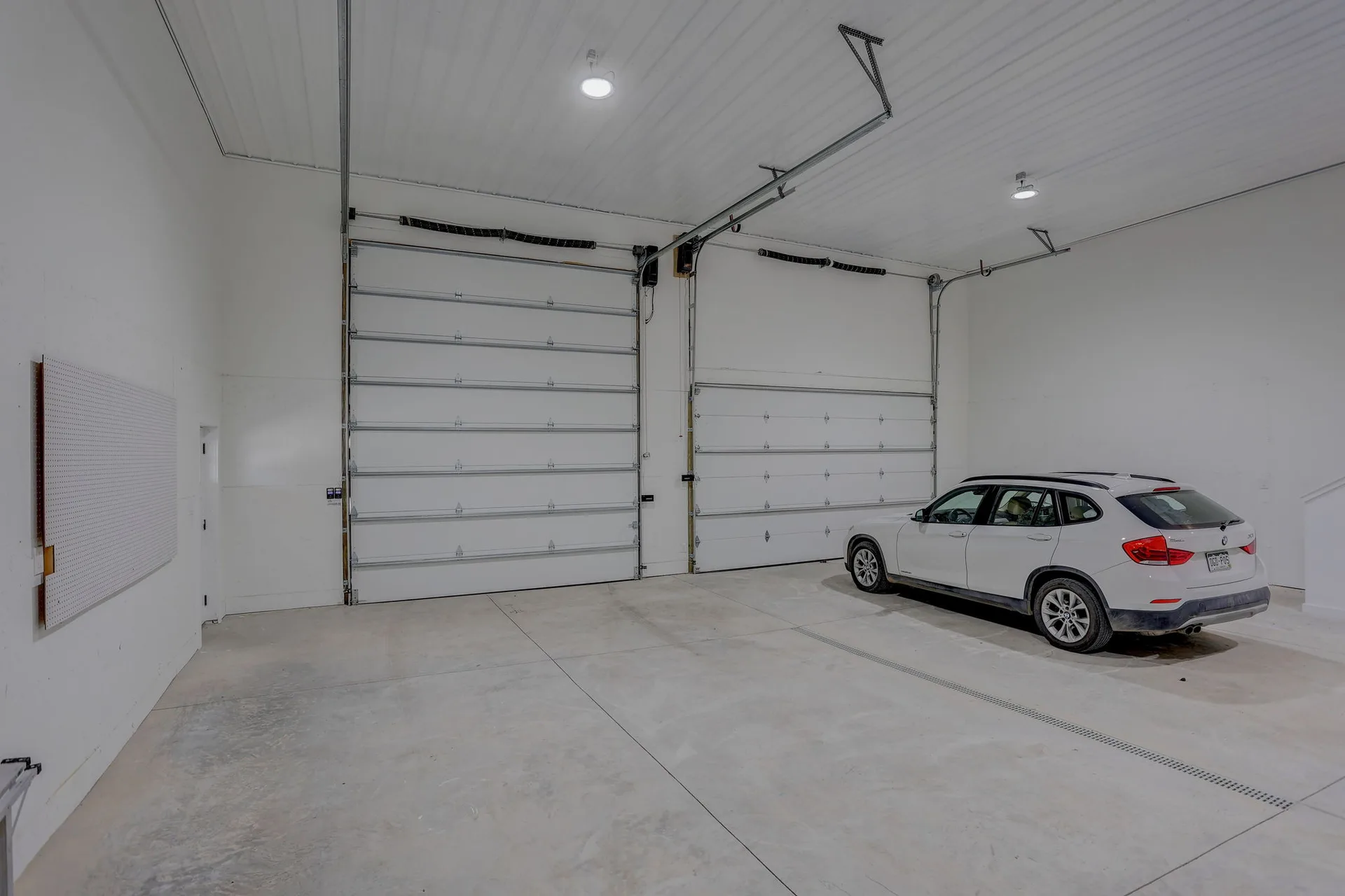 Oversized garage interior with high ceilings