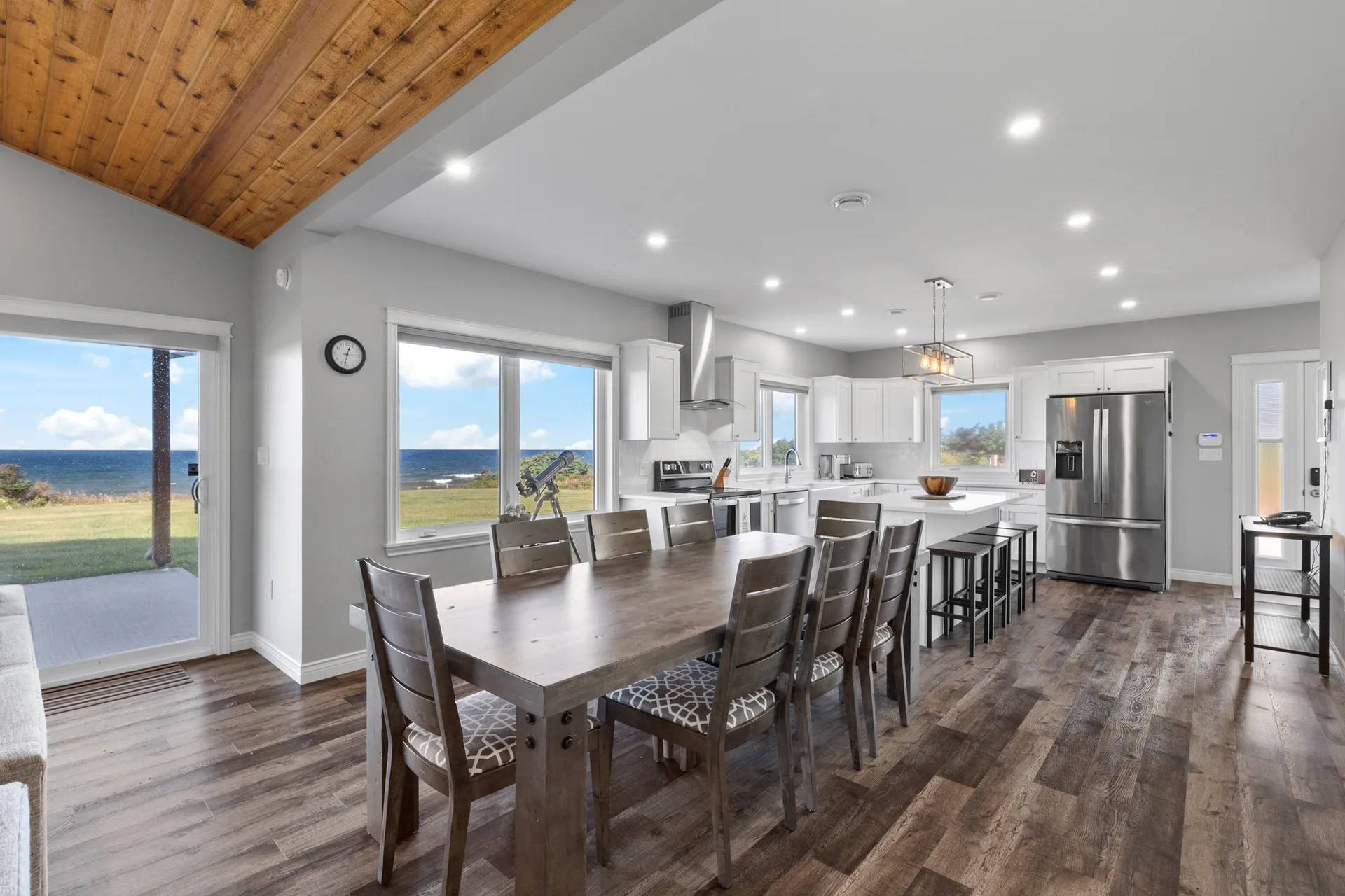 Kitchen and dining area with vaulted ceiling