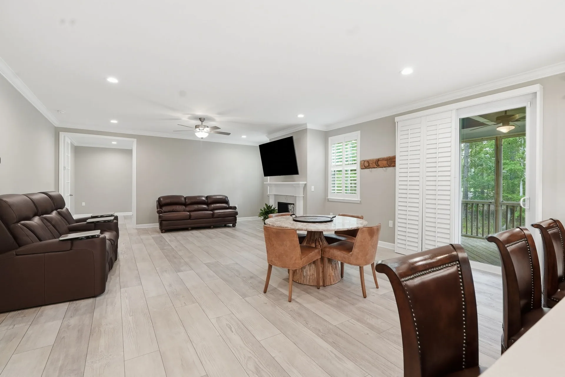 Living and dining area with crown molding