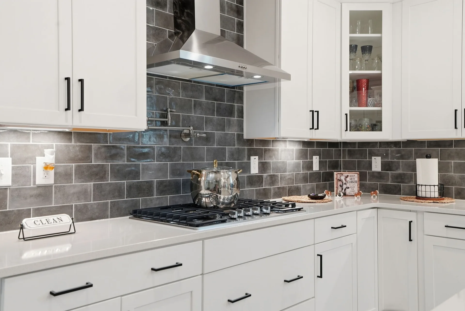 Kitchen range area with subway tile backsplash