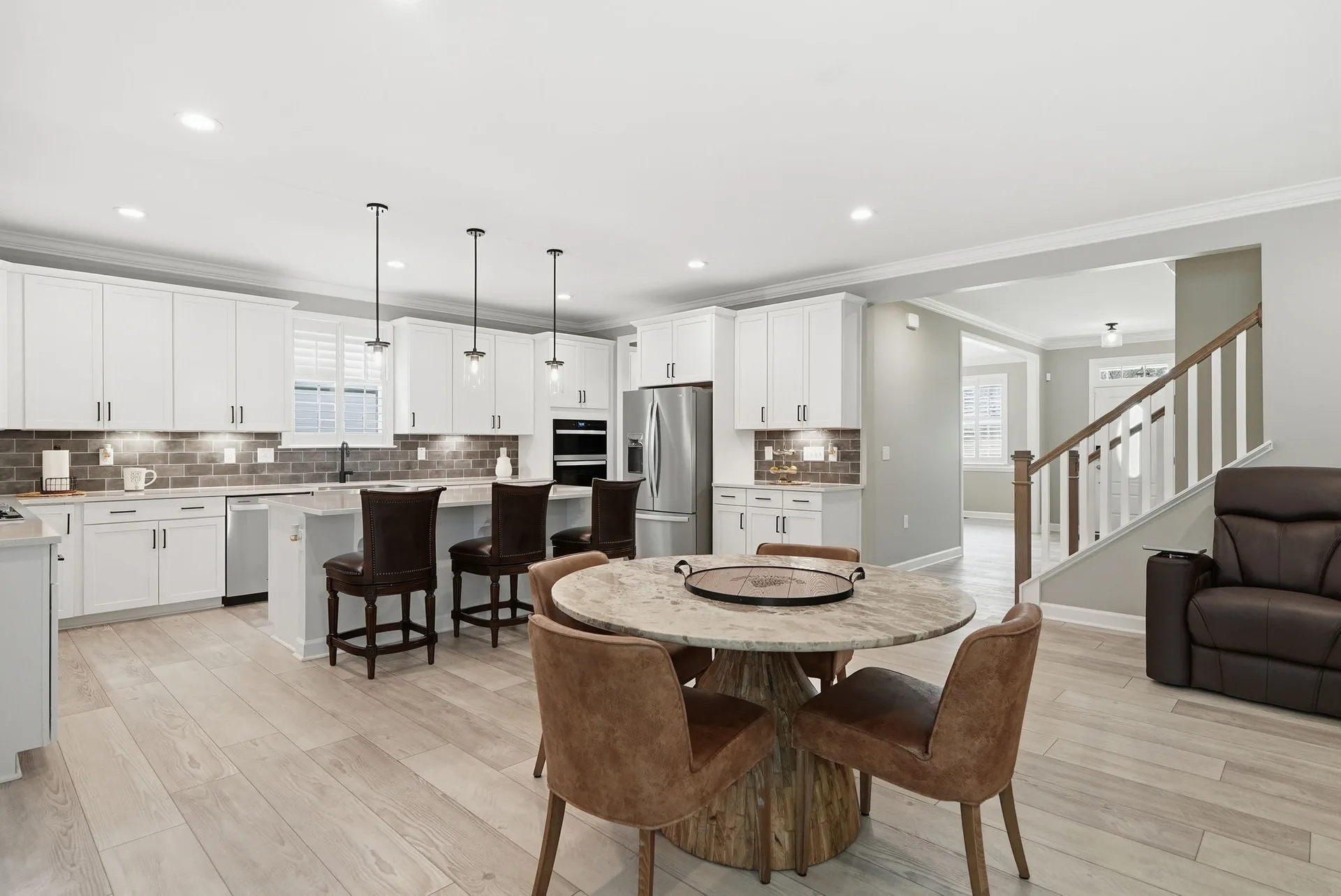 Open kitchen and dining layout with island seating