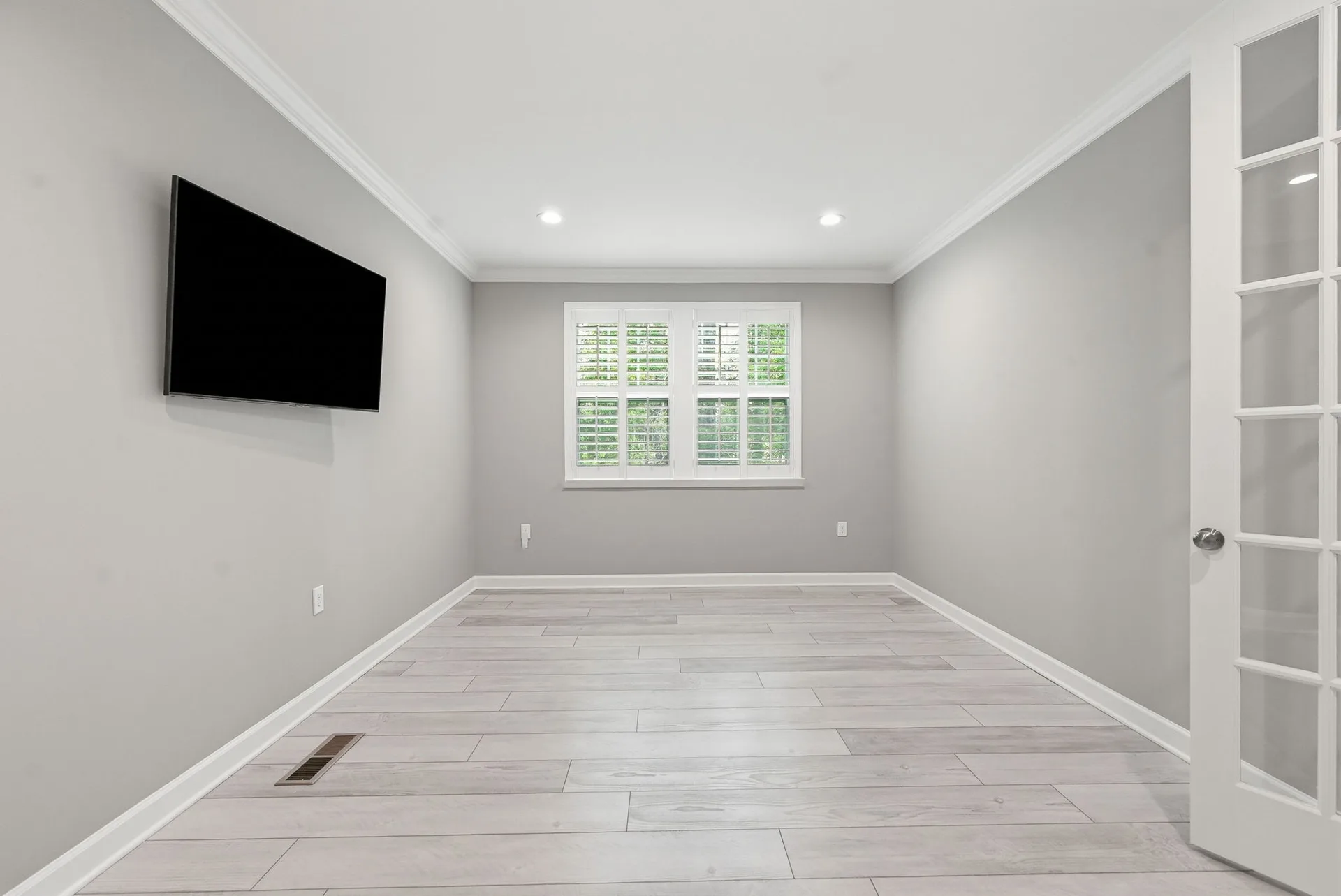 Secondary bedroom or office with plantation shutters