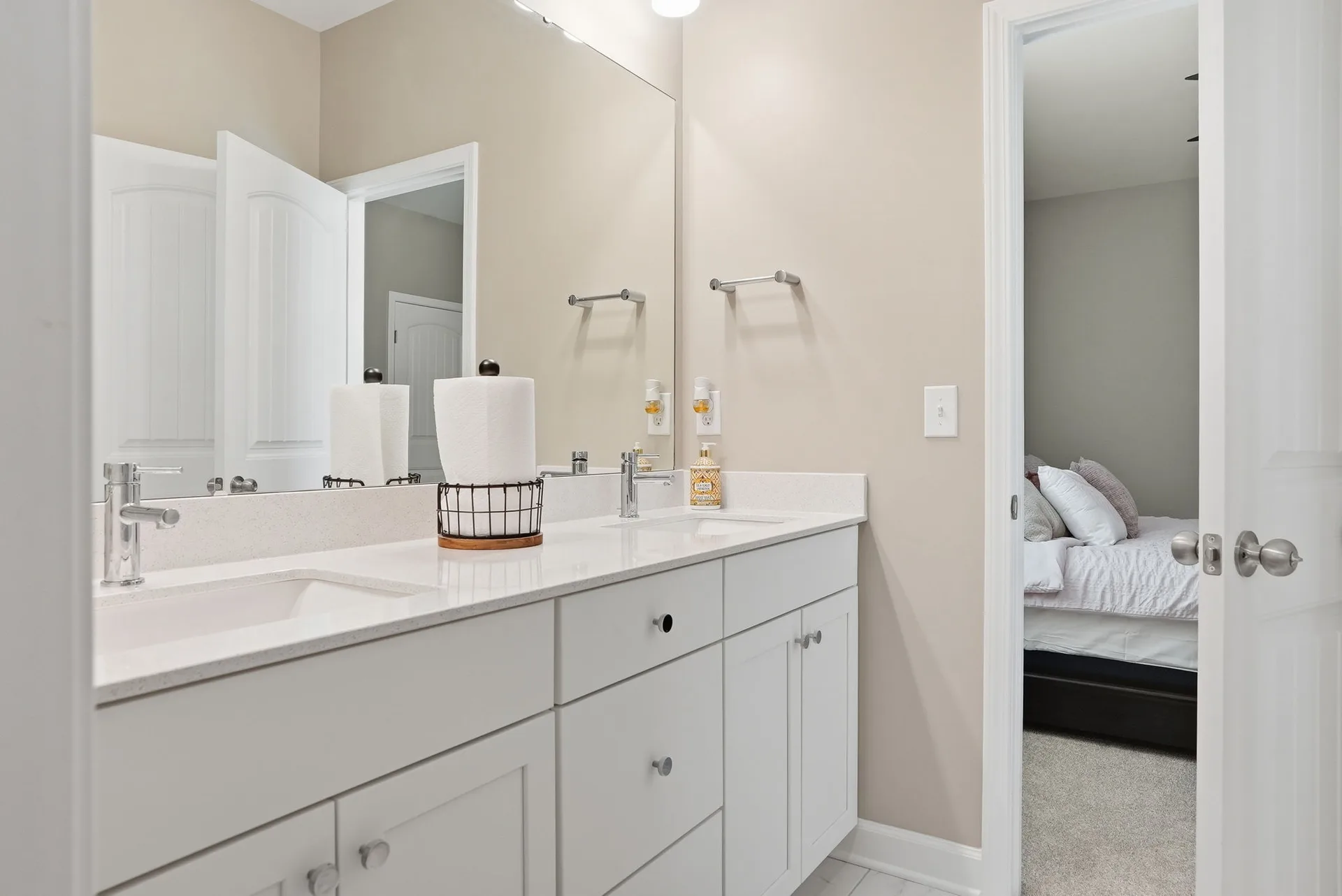 White shaker cabinetry with quartz countertop