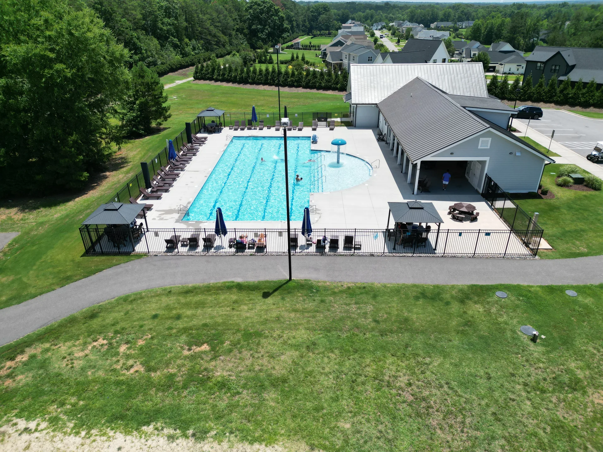 Aerial view of community pool and clubhouse