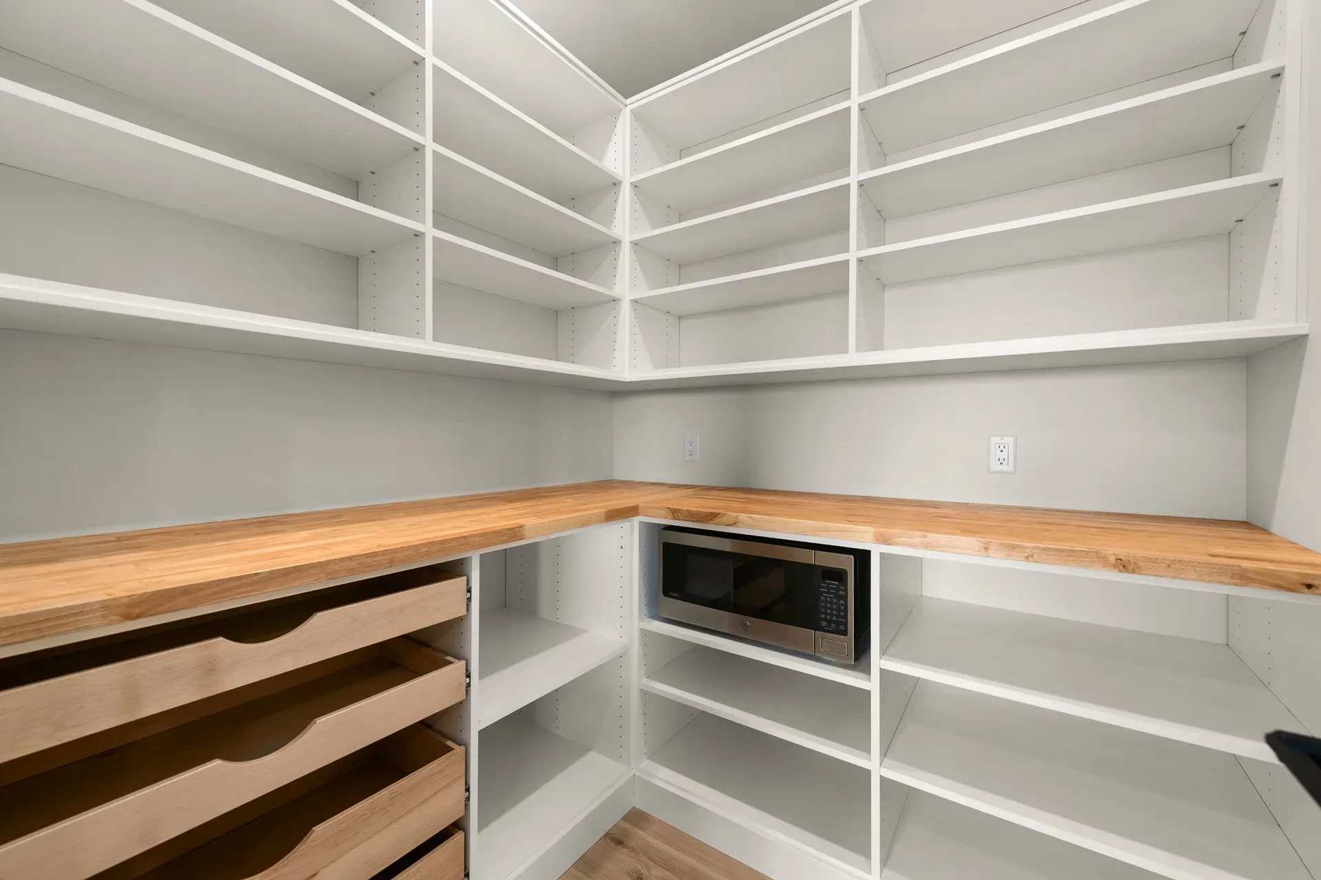 Walk-in pantry with shelving