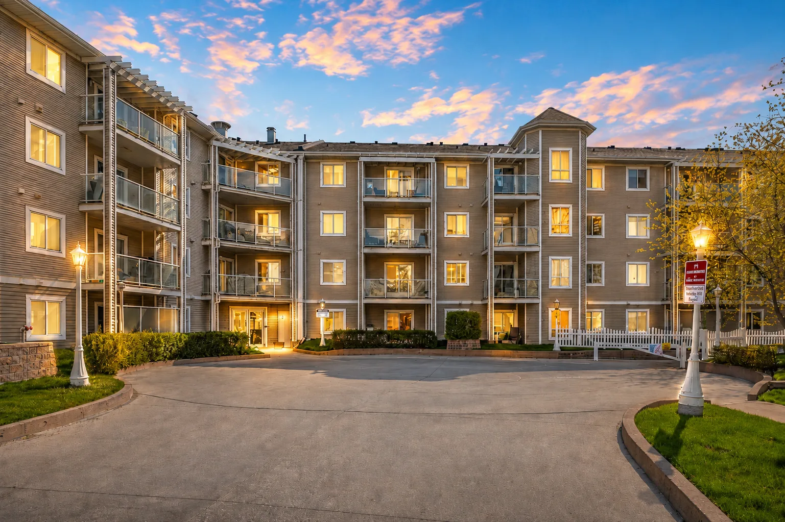 Exterior of the condo building at 260 Shawville Way S.E. in Shawnessy, Calgary, during golden hour