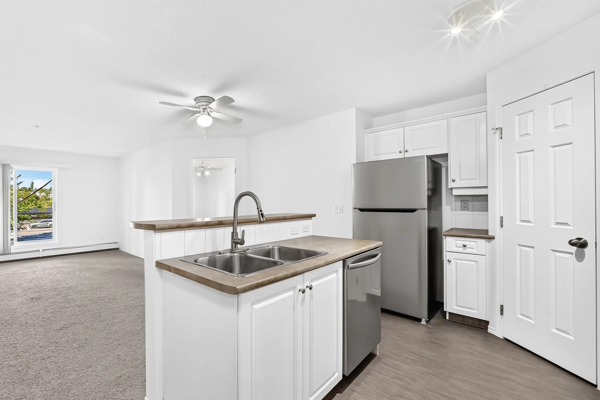 Open-concept kitchen and living room transition