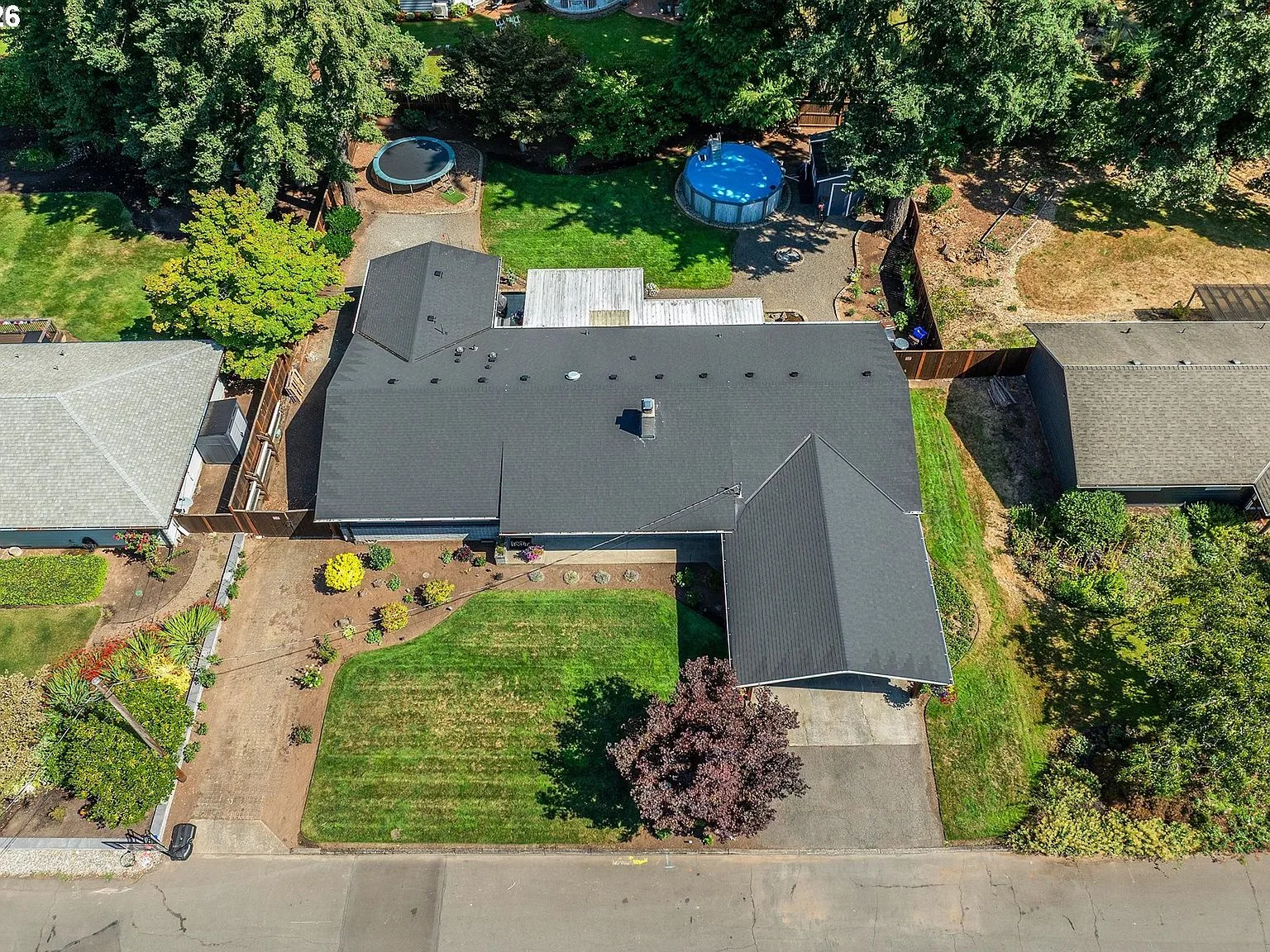 Aerial drone view of the property showing the full .32-acre lot