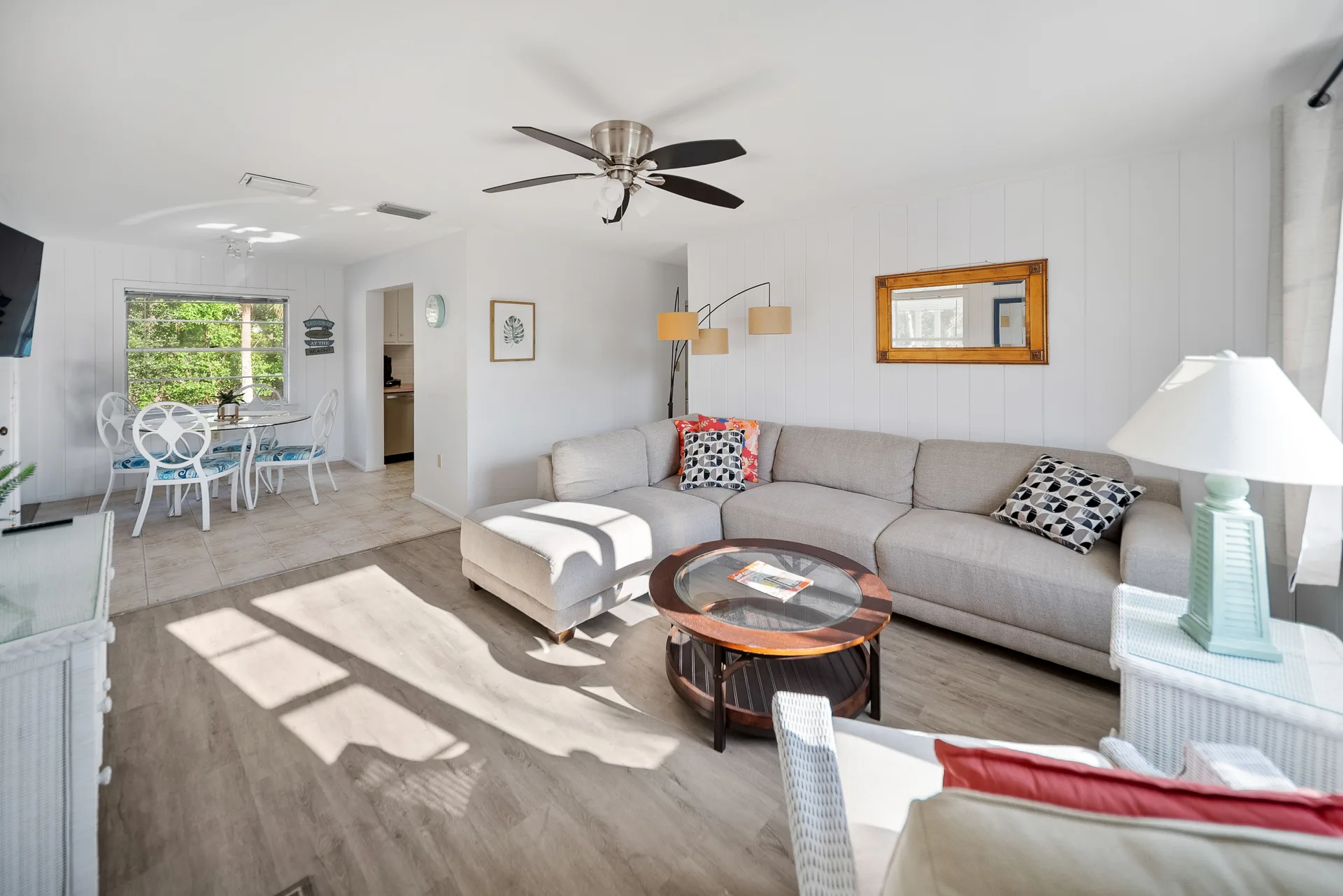 Open concept living and dining area at 5026 Calle Minorga in Sarasota, Florida with modern finishes and natural light
