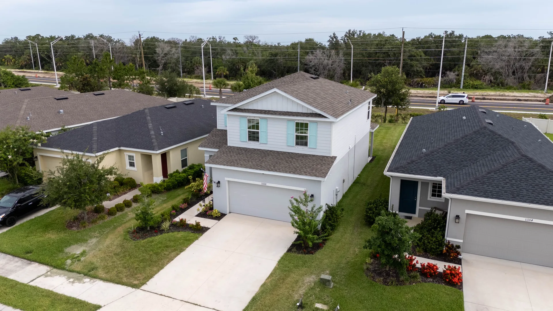 Aerial view of 11026 High Noon Trail in Parrish, Florida, a modern suburban home in the Summerwoods community now under contract