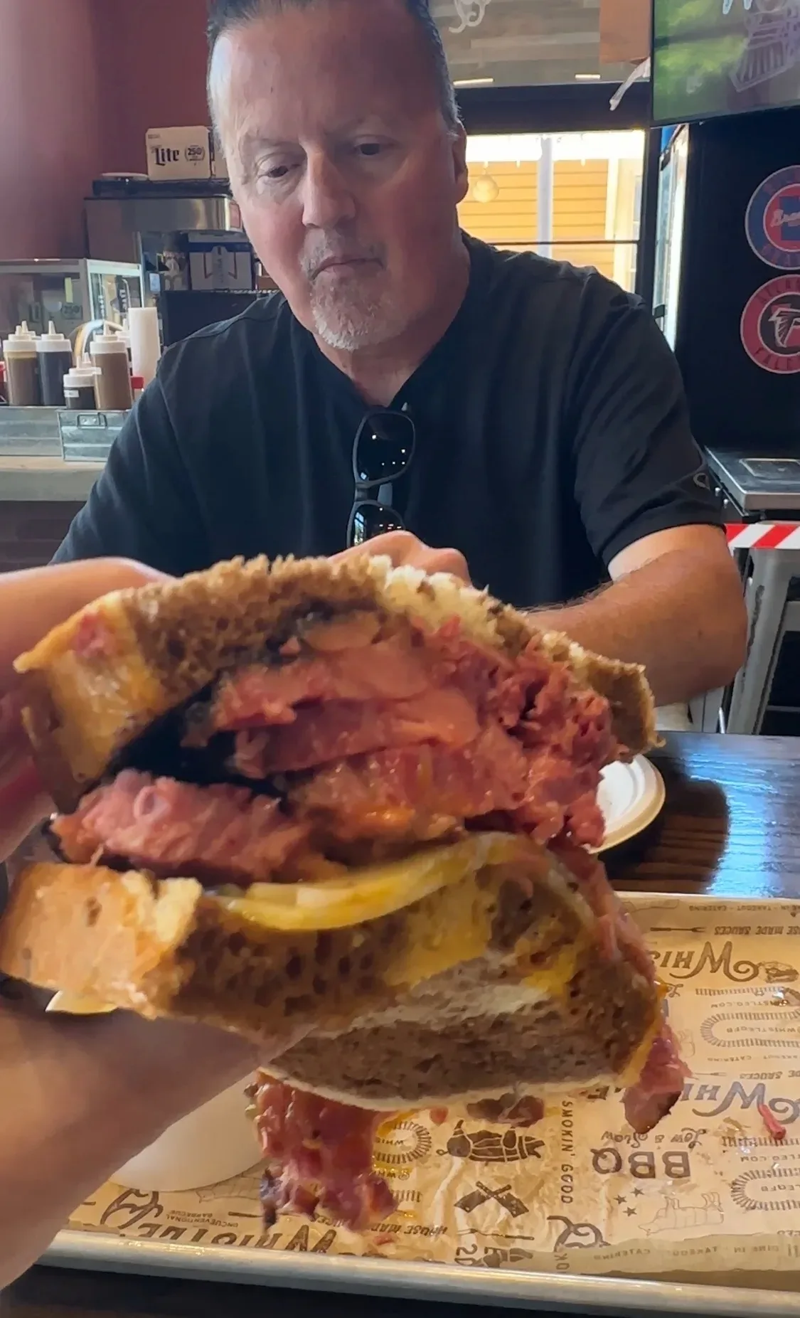 Lisa's photo of the dining experience at Whistle Q in Flowery Branch Georgia, Brisket Pastrami Special on toasted marble rye