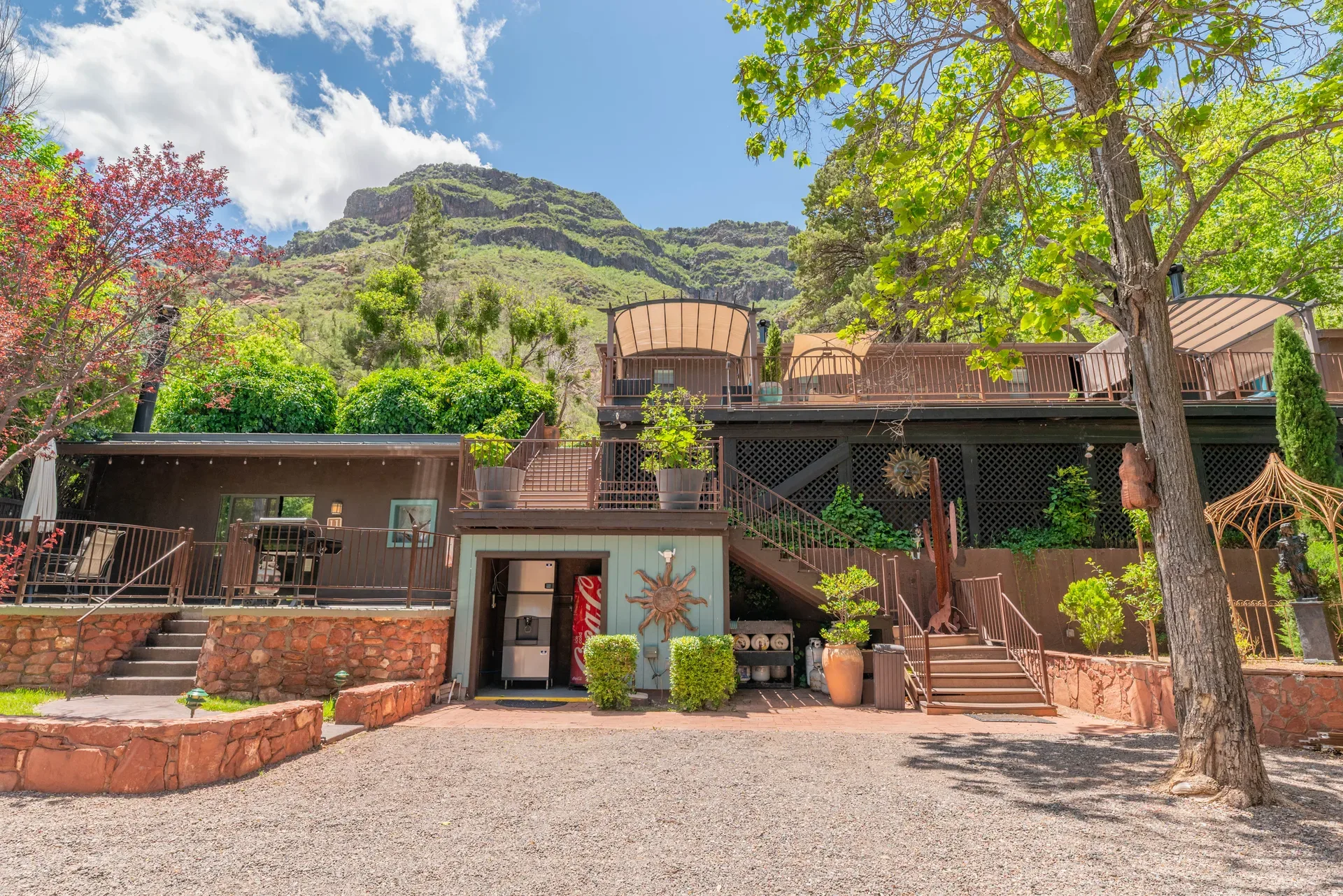 Courtyard with building exterior and mountain backdrop