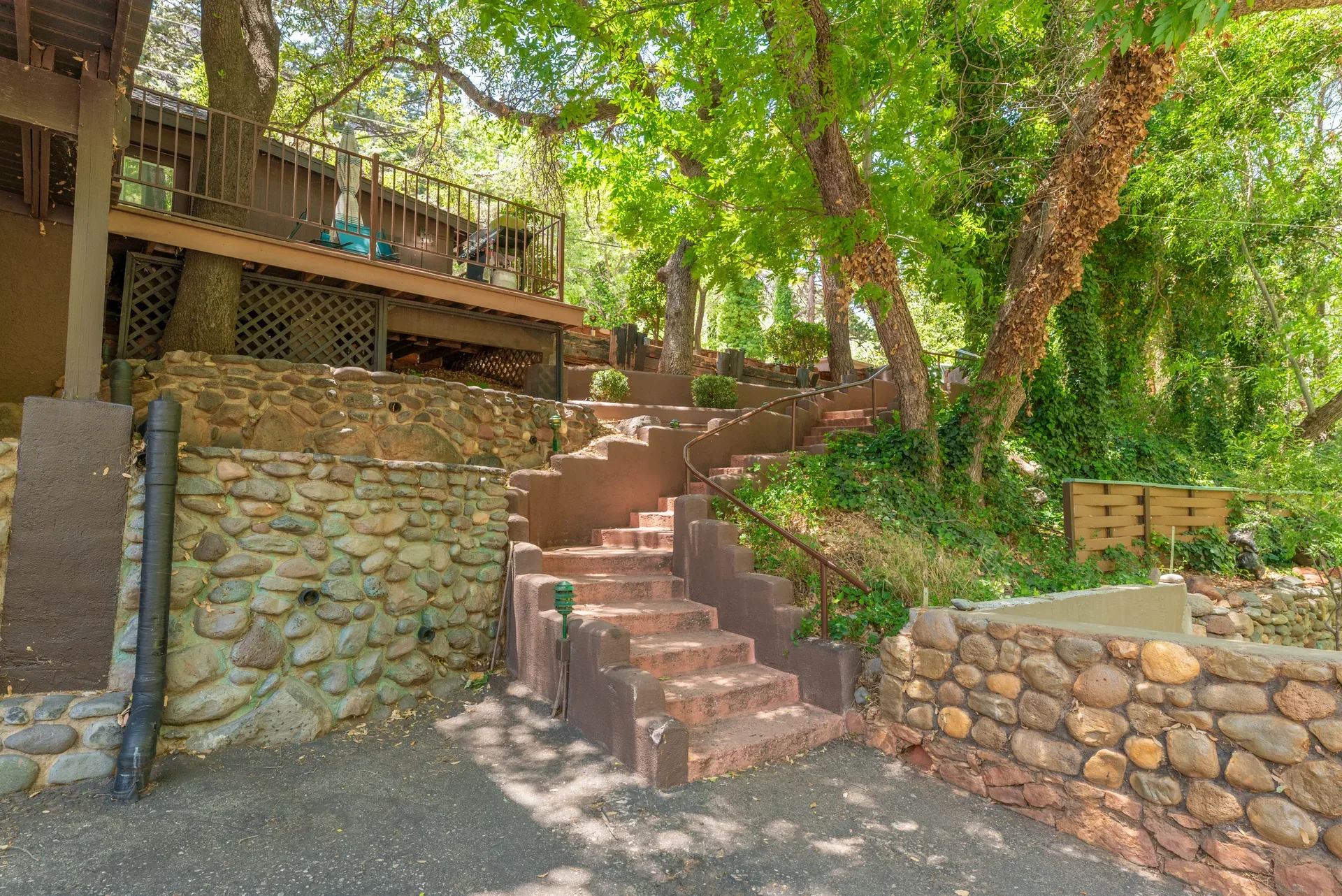 Terraced landscape with stone retaining walls and lush foliage
