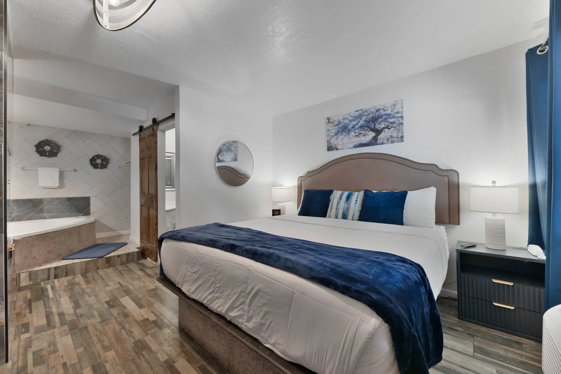 Master bedroom suite with open layout to bathroom area