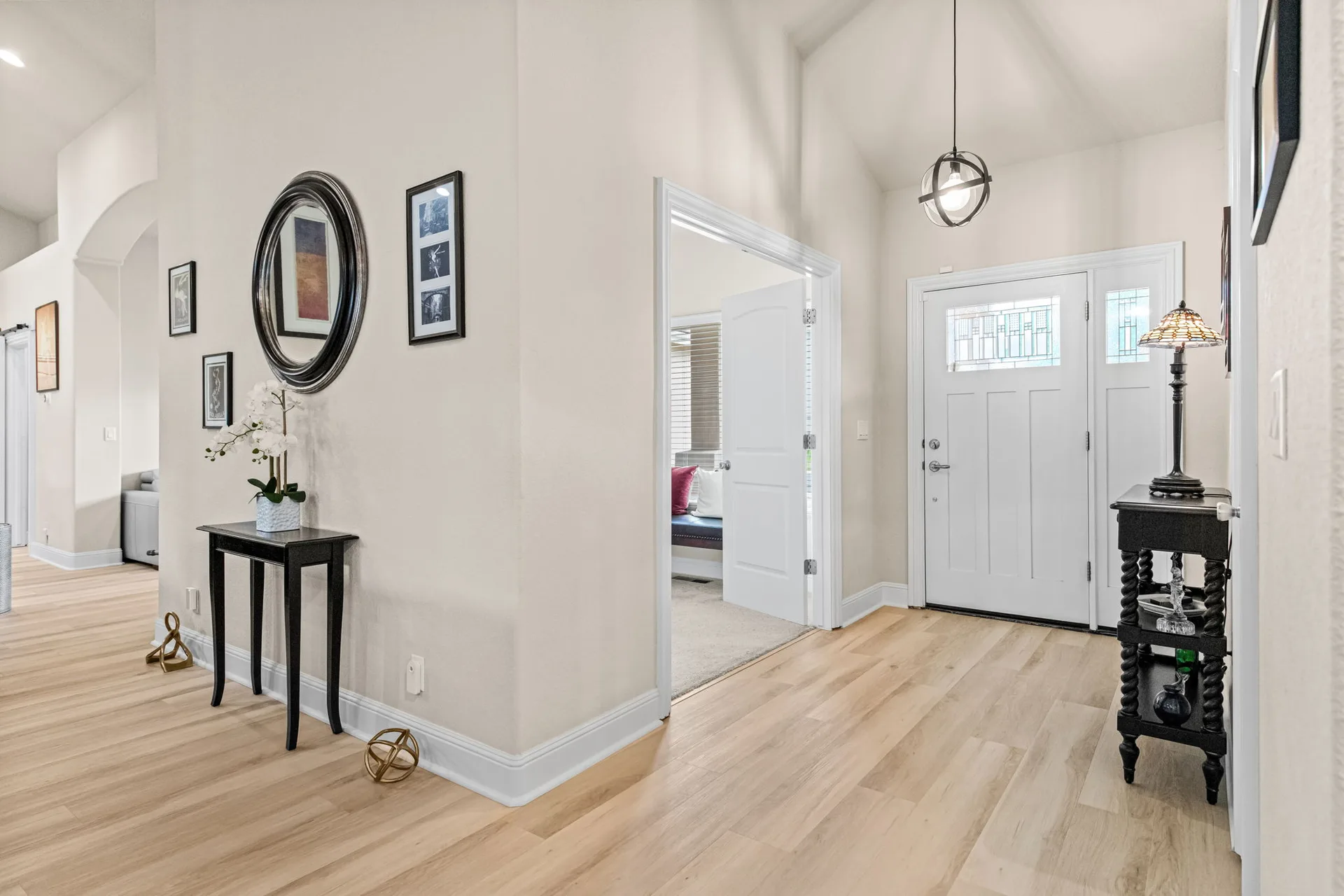 Front entryway with luxury vinyl plank flooring