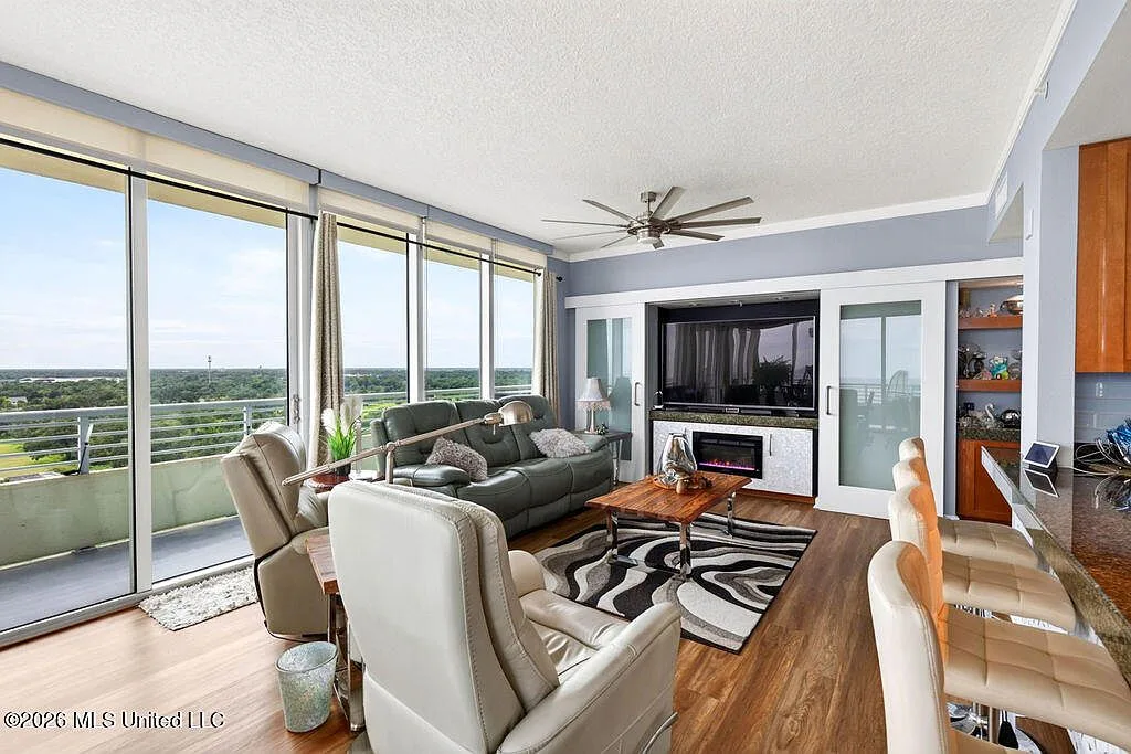 Open-concept living room with modern coastal decor