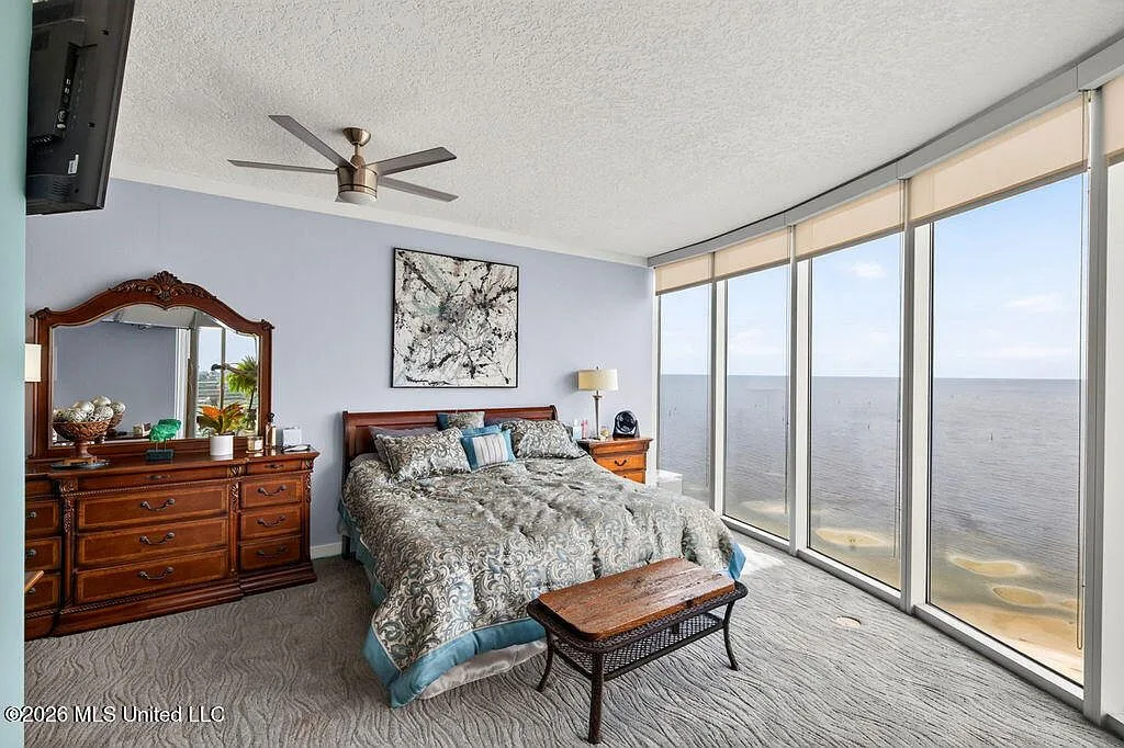 Primary bedroom suite with panoramic Gulf views