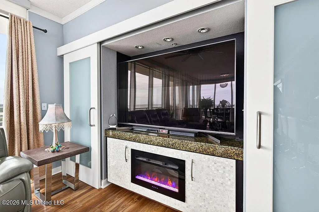 Living room media wall with built-in electric fireplace