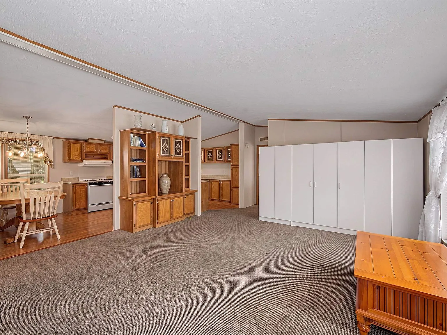 Living room flowing into kitchen area