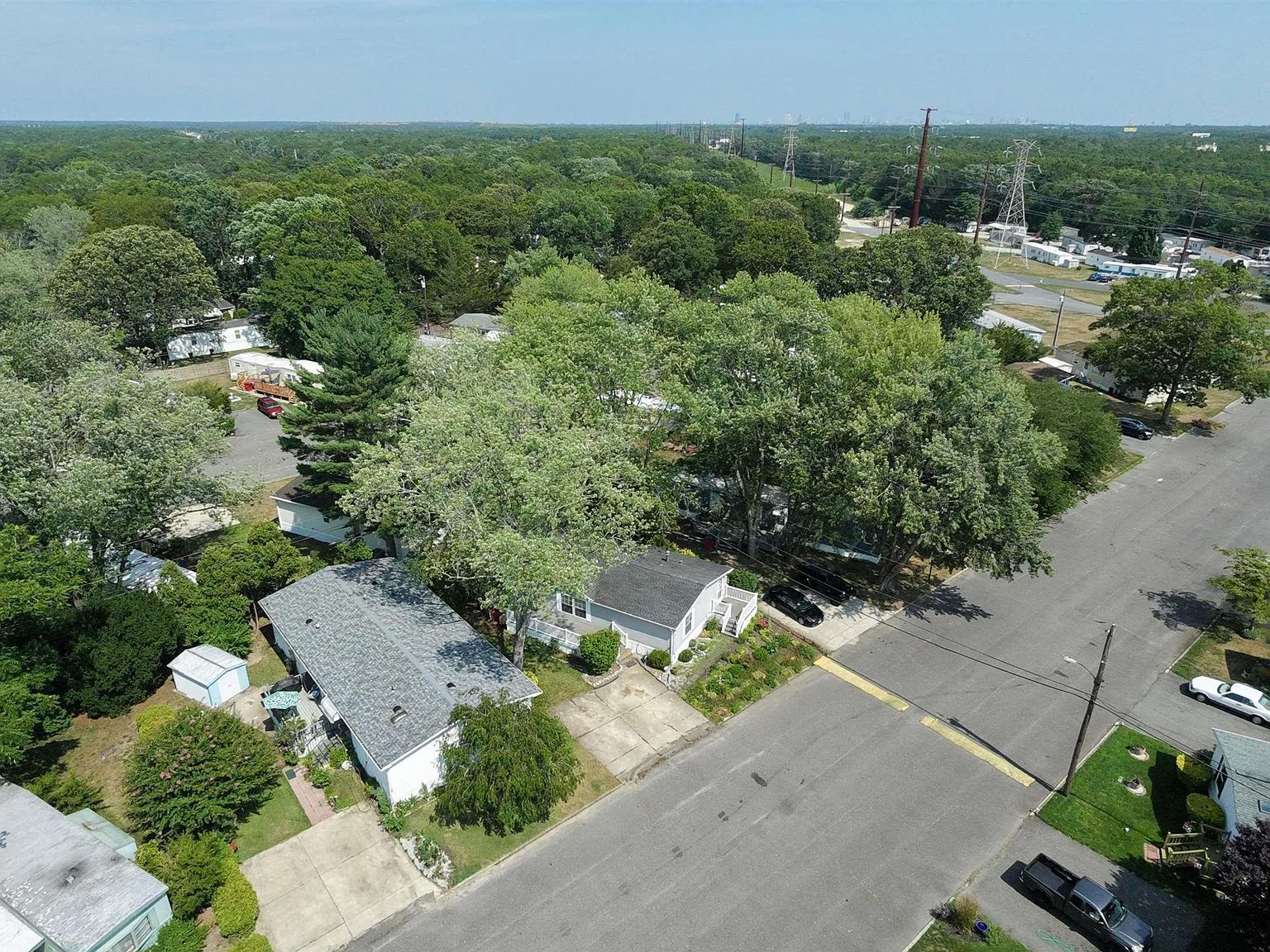 Aerial drone view of the manufactured home and surrounding Tilton Terrace community