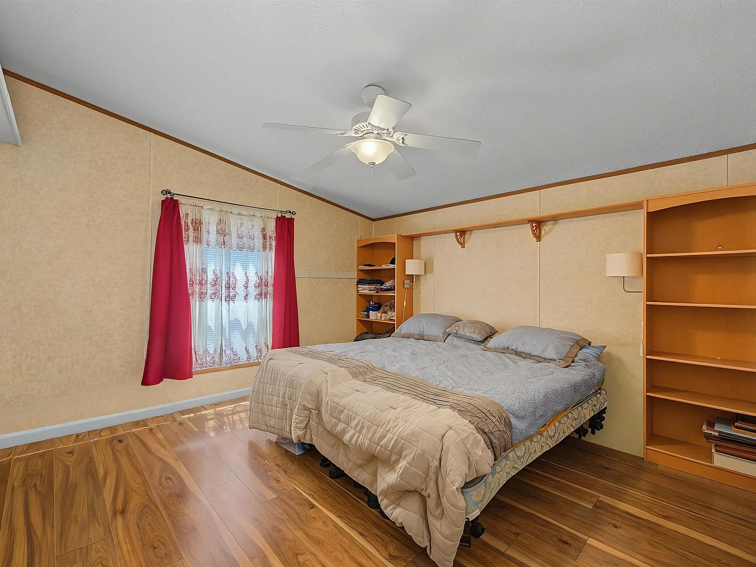 Primary bedroom with built-in shelving