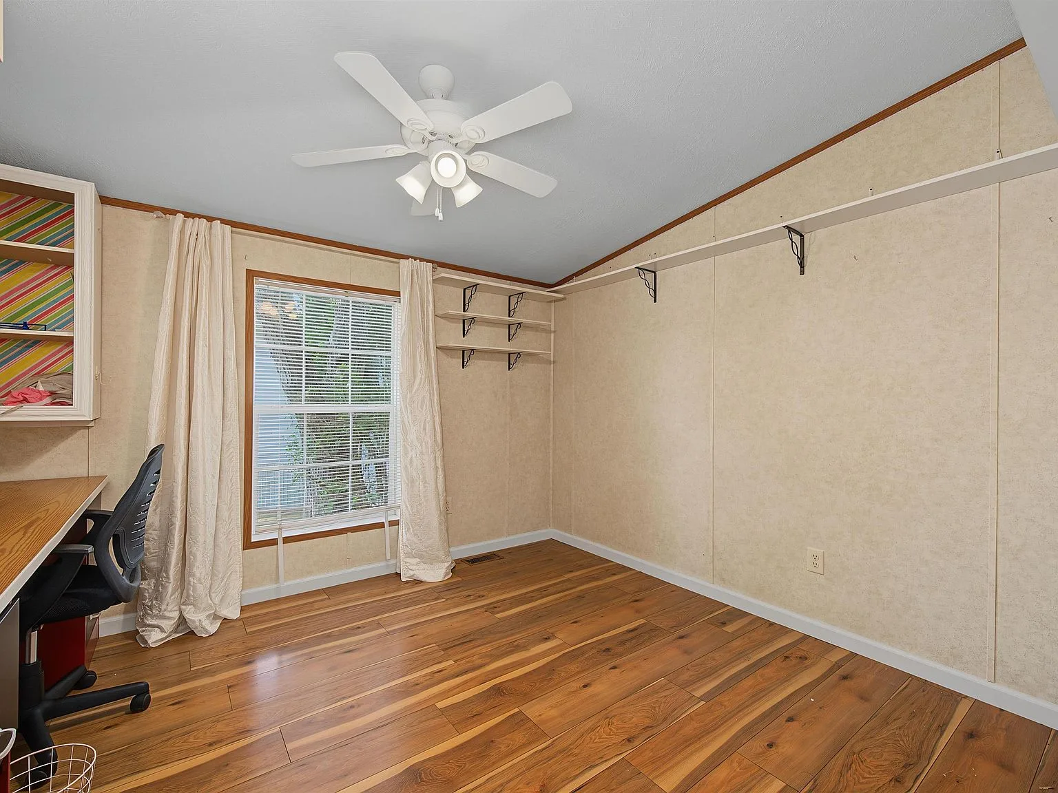 Third bedroom currently used as an office space