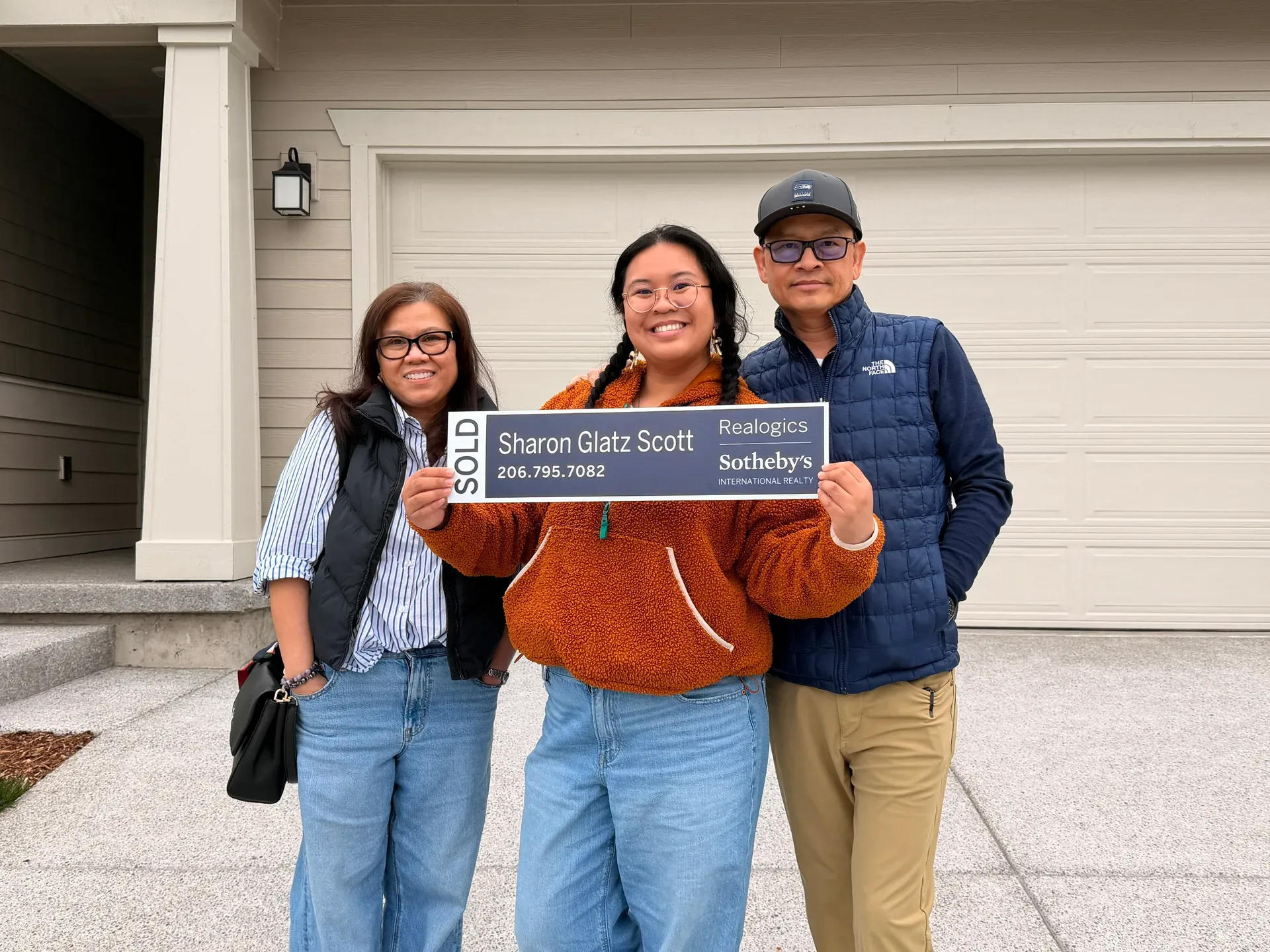 Front facade of Ray and Nancy's new home with SOLD sign