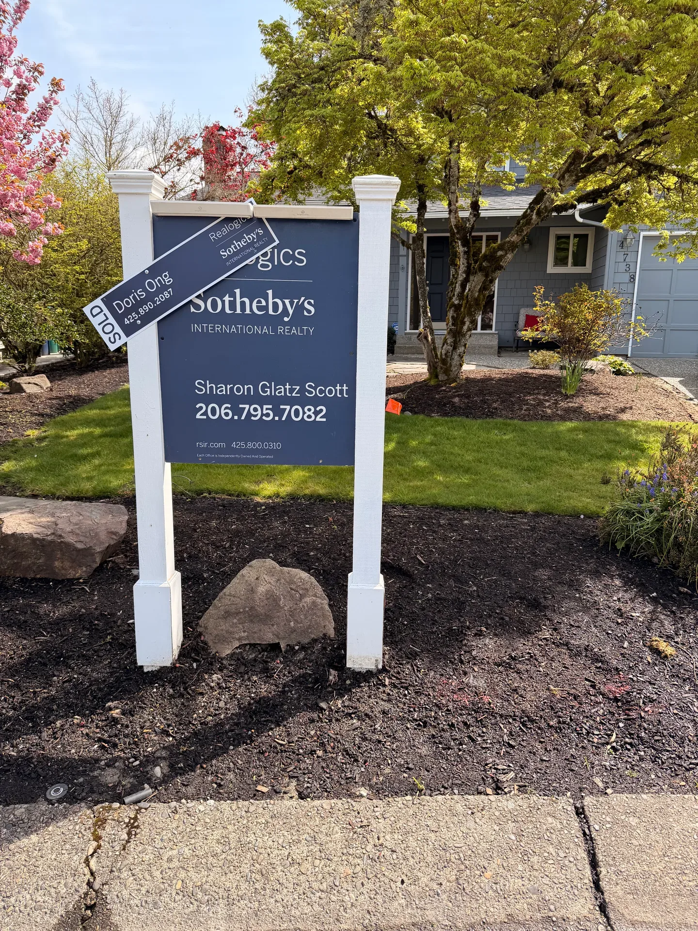 SOLD sign in front of Lynn and Mike's home