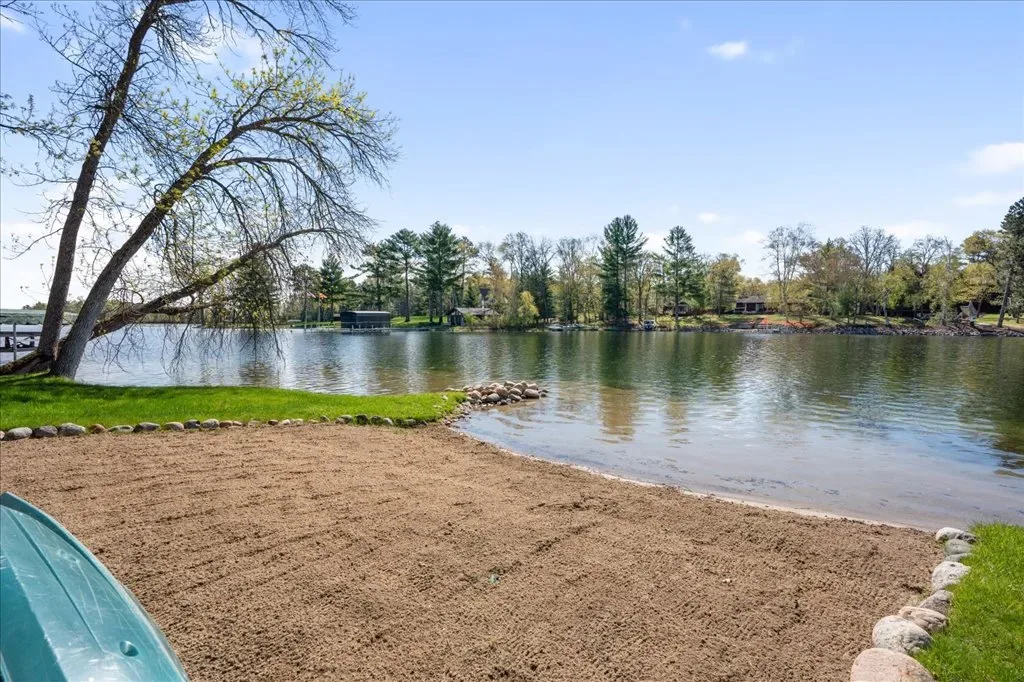 Private sandy beach area along the Whitefish Chain shoreline