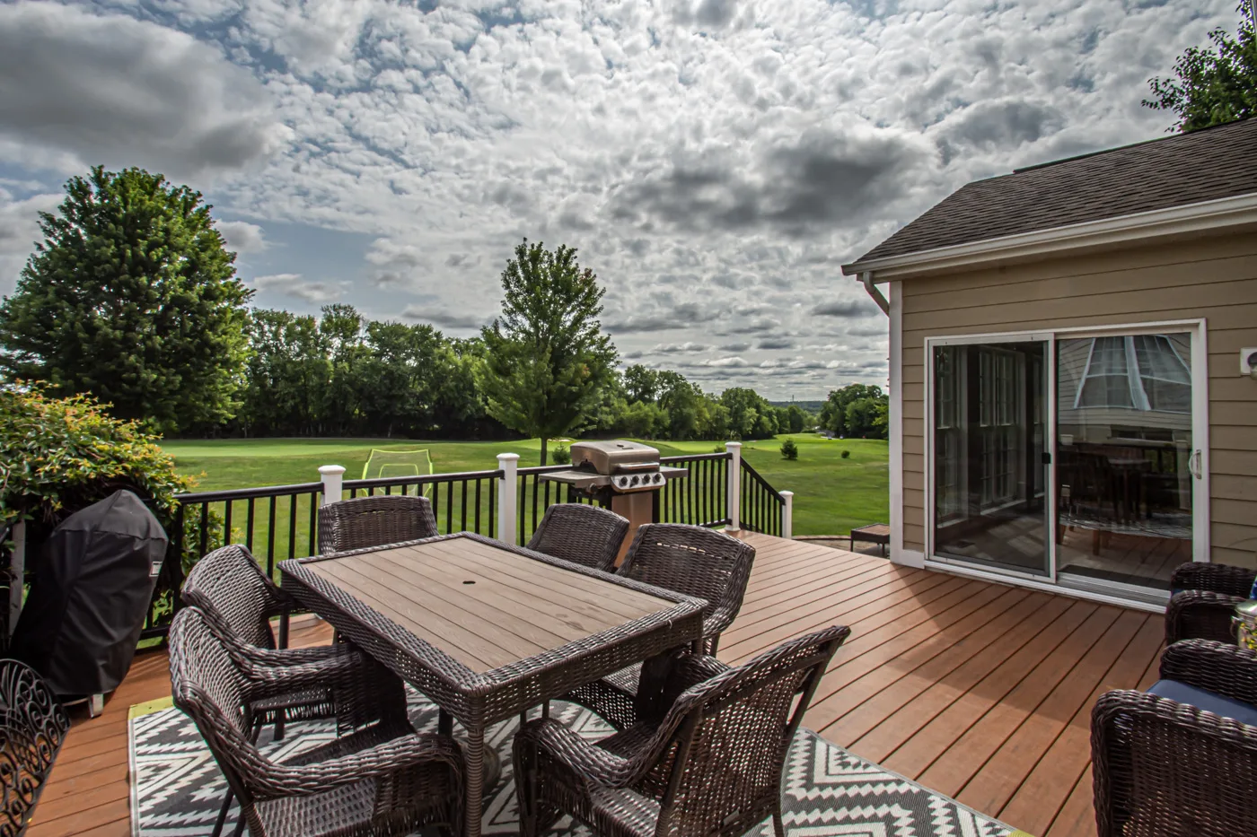 Elevated composite deck overlooking the golf course fairway