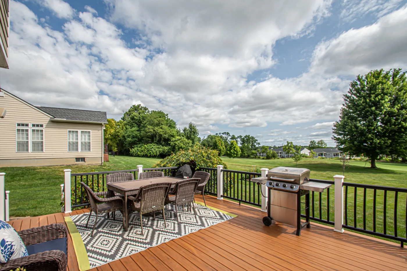 Deck view of the golf course with dramatic sky