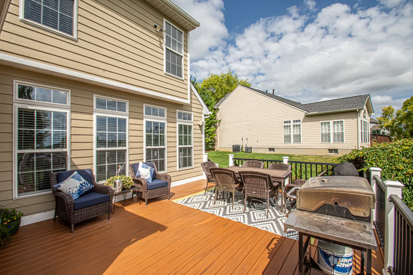 Composite deck with outdoor living space