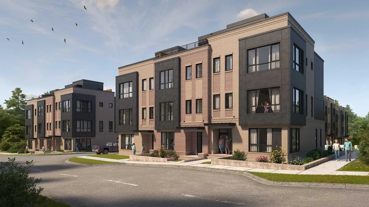 Modern townhome exterior in Cary, NC with tan and dark grey facade