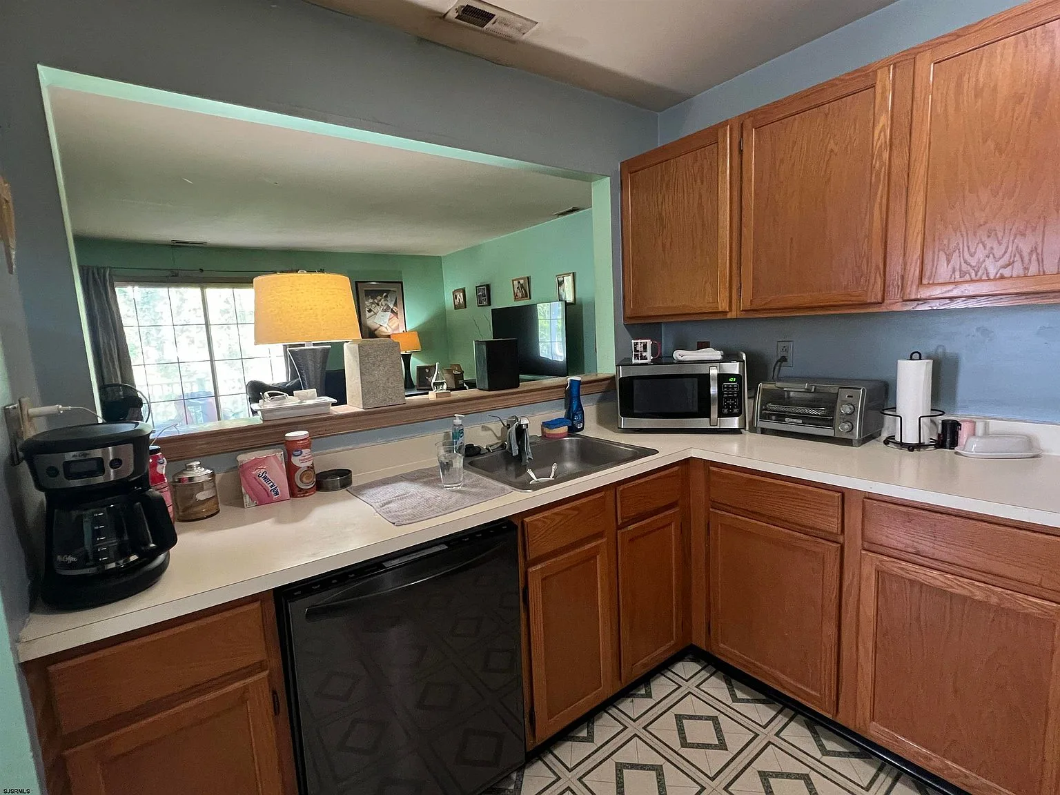 Kitchen pass-through opening to the living area