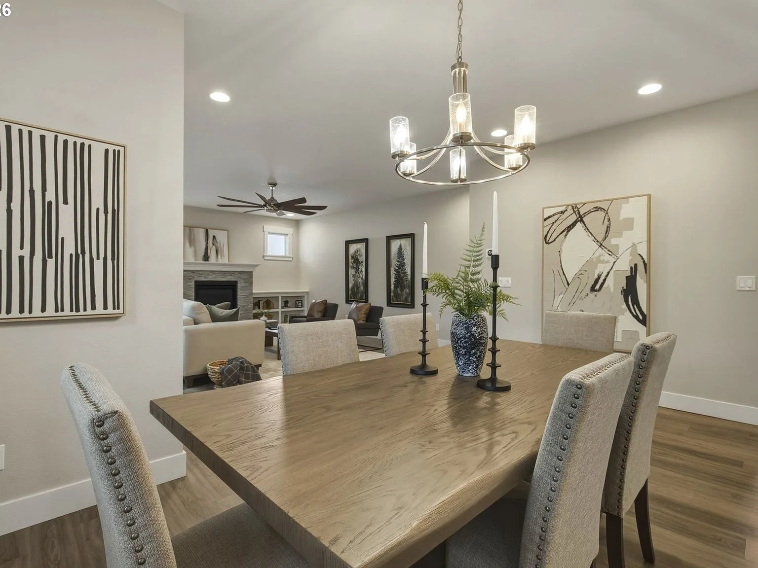 Open-concept view from dining area into living room