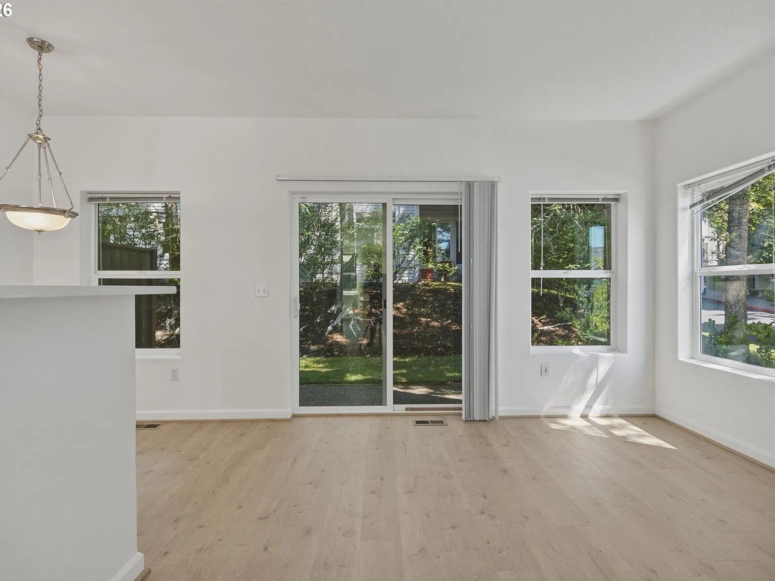 Dining area with sliding glass door and bar top