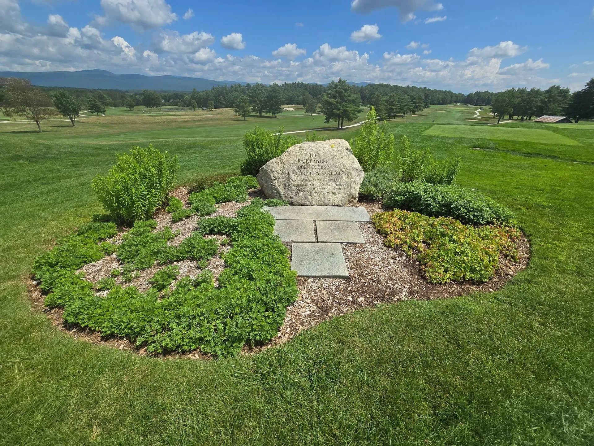 The memorial stone honoring Ralph O. Myhre at the entrance to the golf course