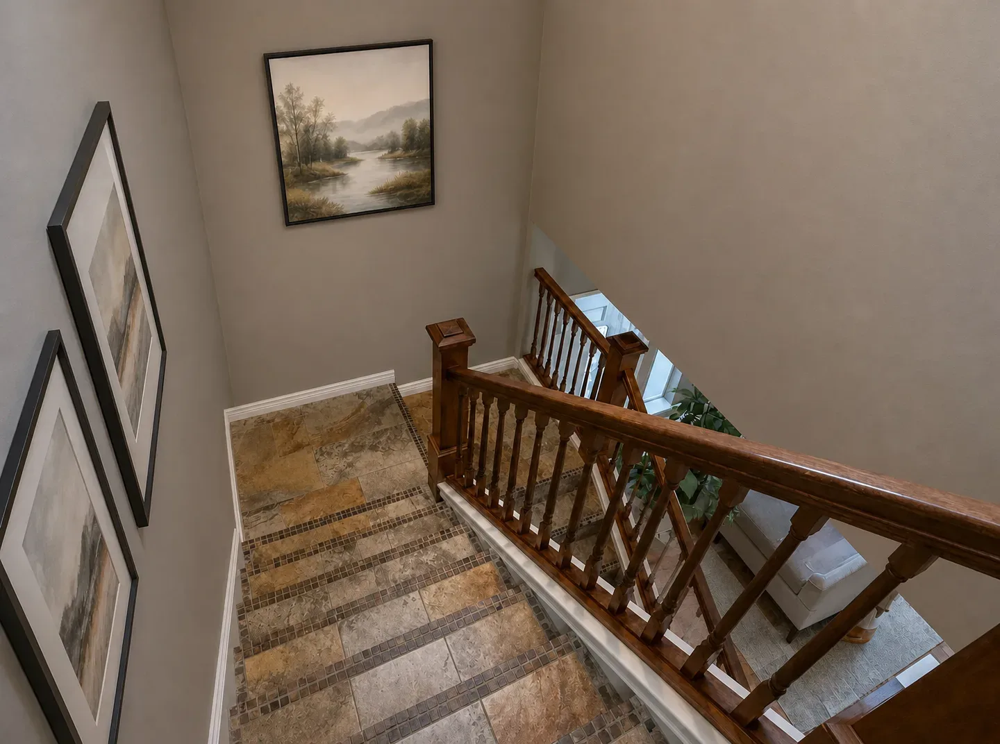 Staircase landing with wood railing and stone steps