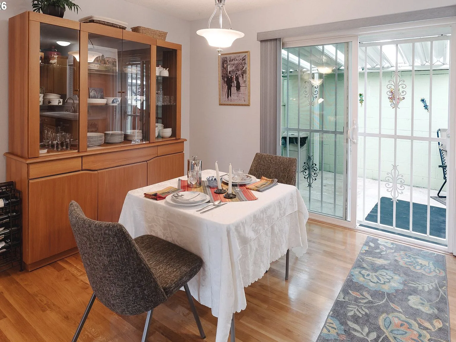 Dining area with sliding patio doors opening to the covered patio