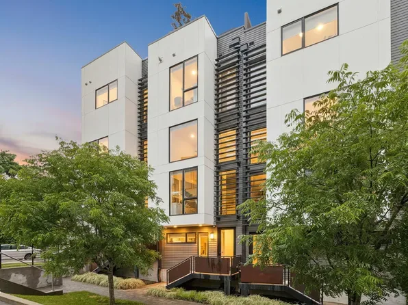 Modern townhouse facade representing downtown Durham condo living