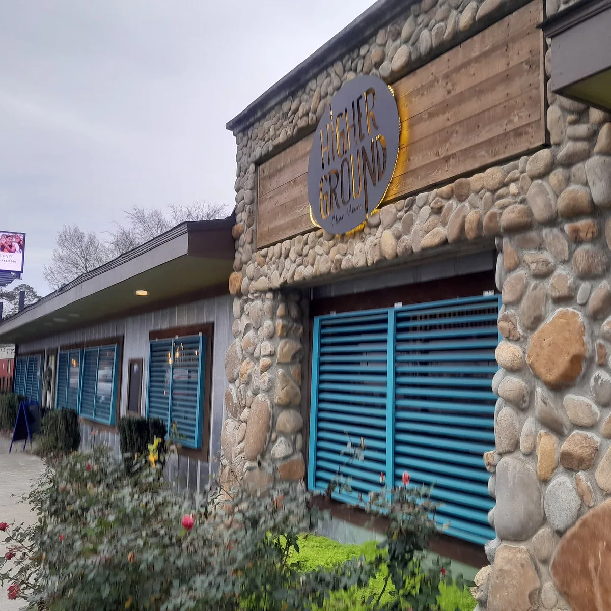 Exterior of Higher Ground Char House in Chapin, SC — a commercial storefront with stone siding