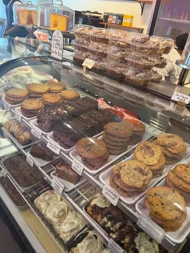A bakery display case at ButterKreme Queen in Irmo, SC, filled with freshly baked treats