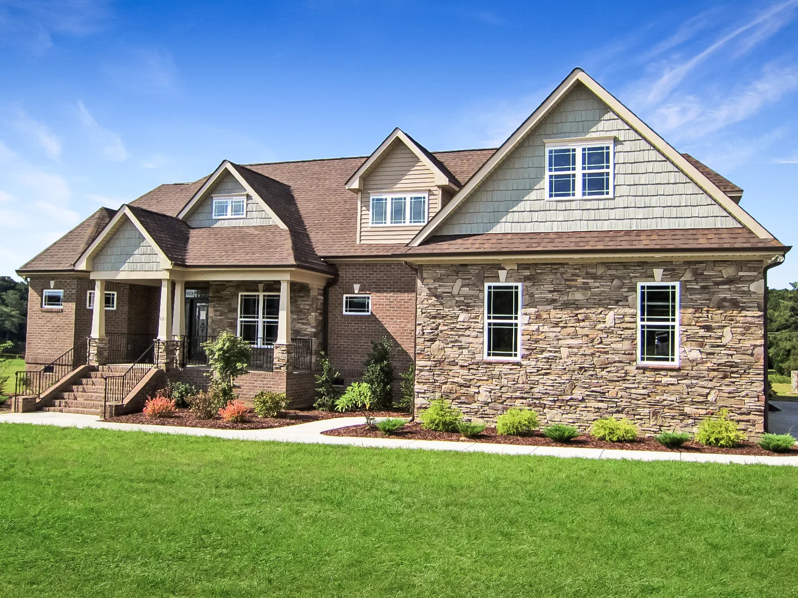 Stone and brick craftsman home exterior in Clayton, NC