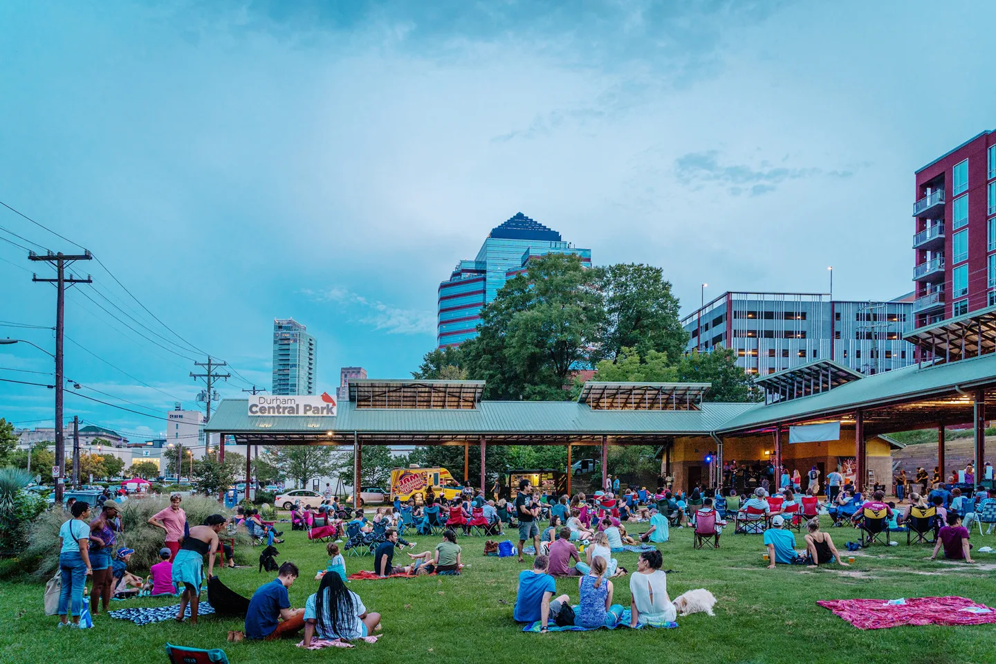 Durham Central Park gathering space with people enjoying the urban green